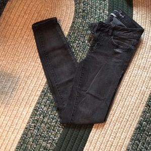Black distressed jeggings